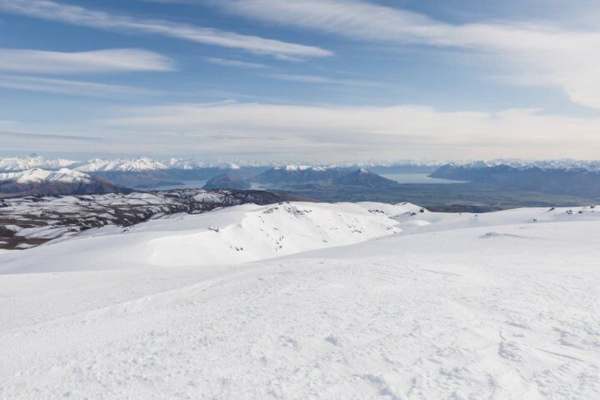 A snowy mountain landscape with a clear sky. 3