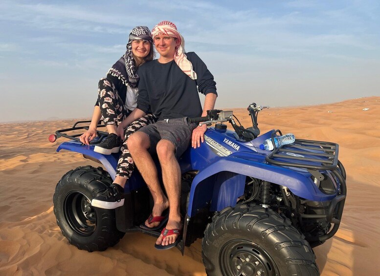 Dubai: Beginner Quad Bike Tour with Sandboarding & Transfer 1