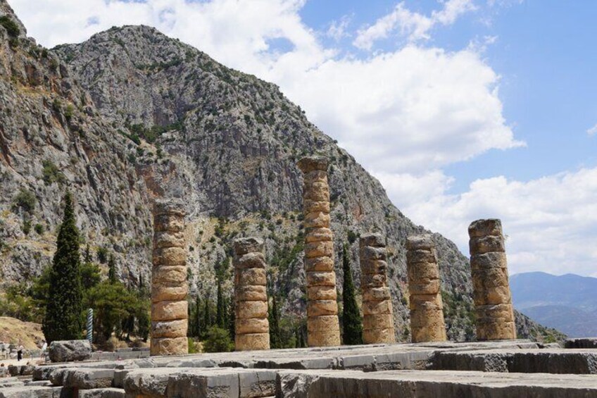 Ancient stone columns in a mountainous landscape. 3