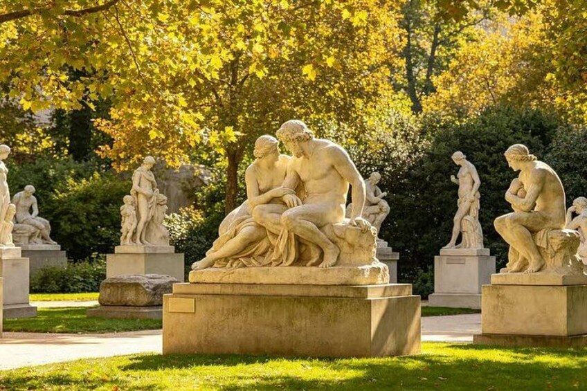 A sculpture garden with classical statues. 3