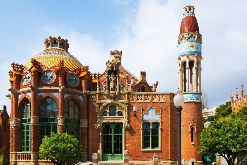 A historic building with ornate architecture, a clock tower, and a dome. 5