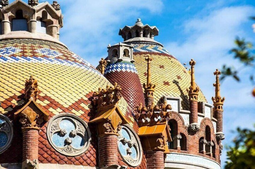 A colorful, ornate building with domed roofs and intricate architectural details. 3