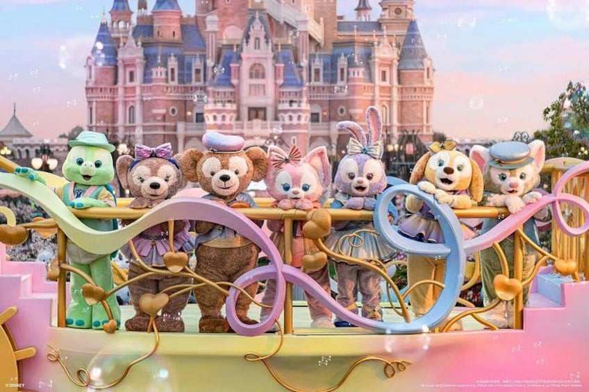 A row of animated characters on a colorful ride with a castle in the background. 4
