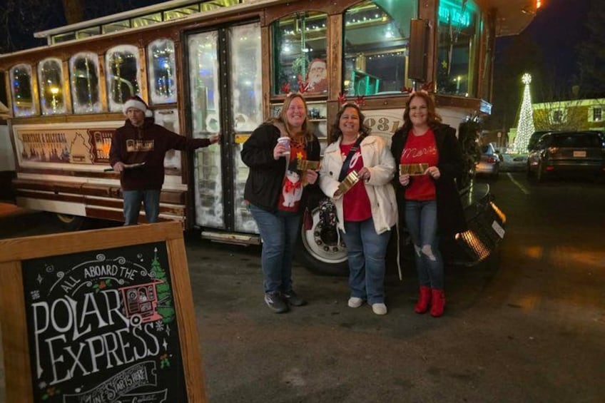 A food truck with a sign that reads 'All Aboard the Polar Express.' 3