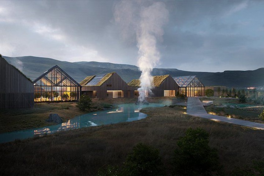 A modern building complex with a glass-roofed structure, a wooden barn, and a smoke stack emitting steam. 2