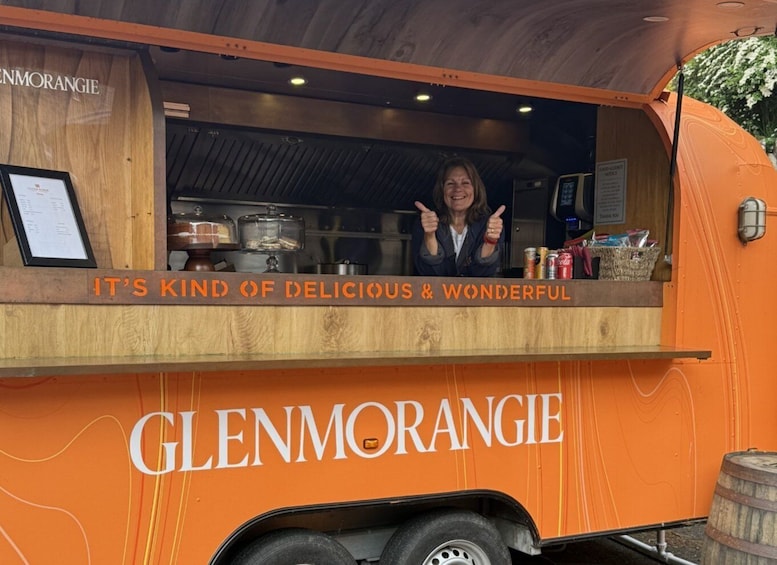 A food truck with the name 'GLENMORANGIE' and a sign that says 'IT'S KIND OF DELICIOUS & WONDERFUL.' 4