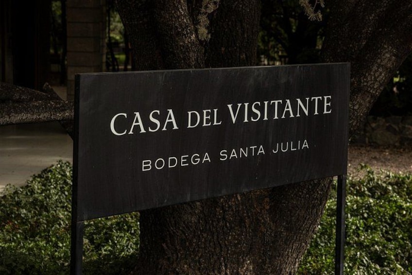 A sign for 'CASA DEL VISITANTE' in Bodega Santa Julia. 3