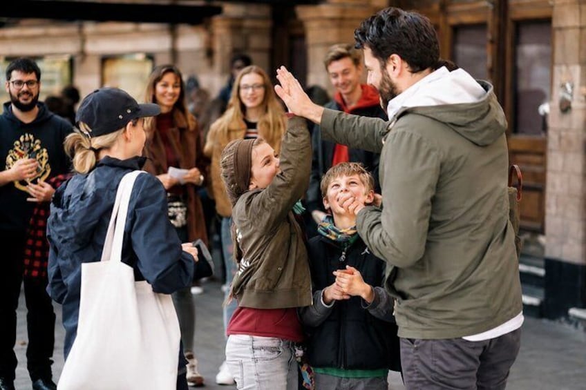A group of people walking on a street. 3