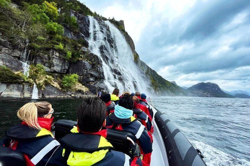 Passengers admiring a waterfall 2