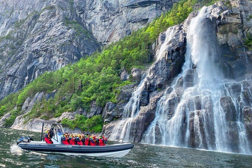 The waterfalls in the fjord during summer 4