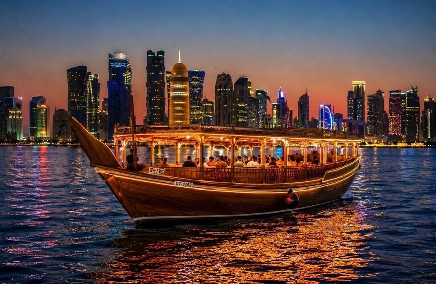 A traditional wooden boat with passengers, sailing on water with a city skyline in the background. 3