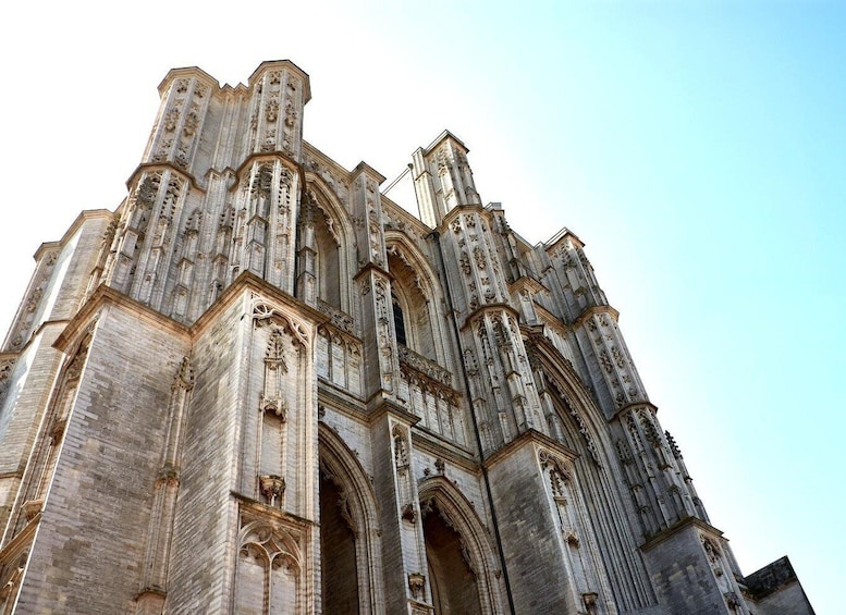 A Gothic cathedral with intricate stonework and pointed arches. 2