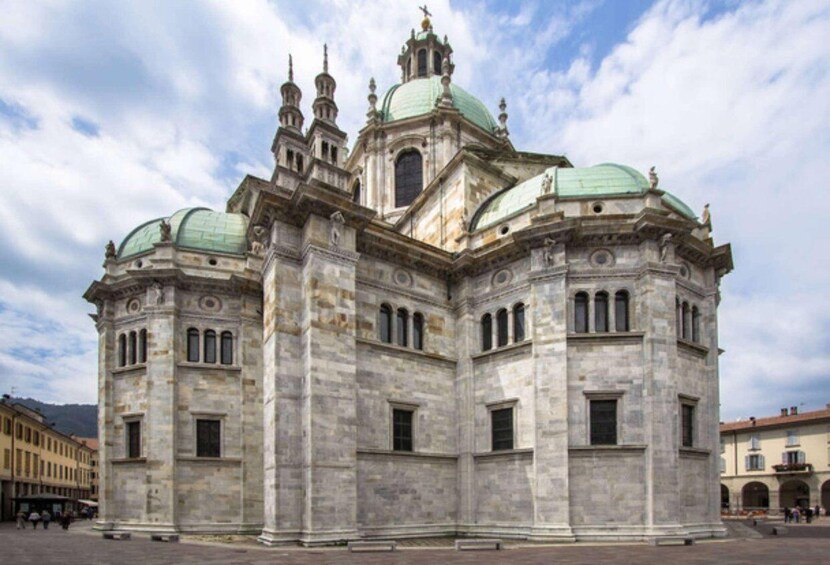 A historic building with multiple domes and towers, featuring classical architecture. 4
