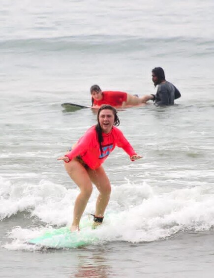 A person surfing on a wave. 4