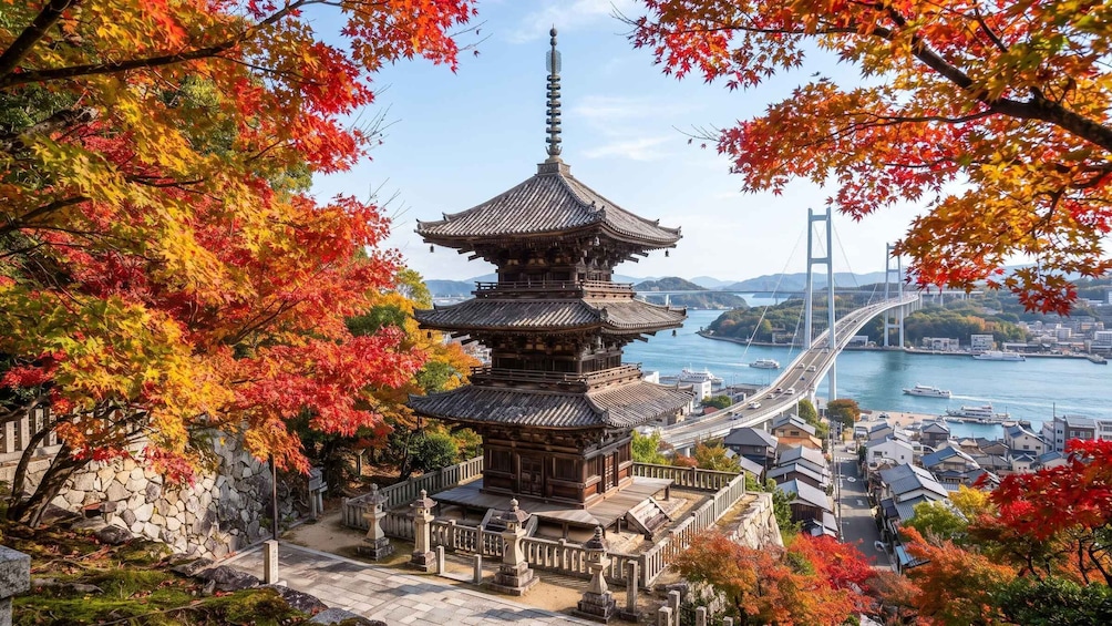 A traditional Japanese pagoda surrounded by autumn foliage, with a modern bridge and cityscape in the background. 1
