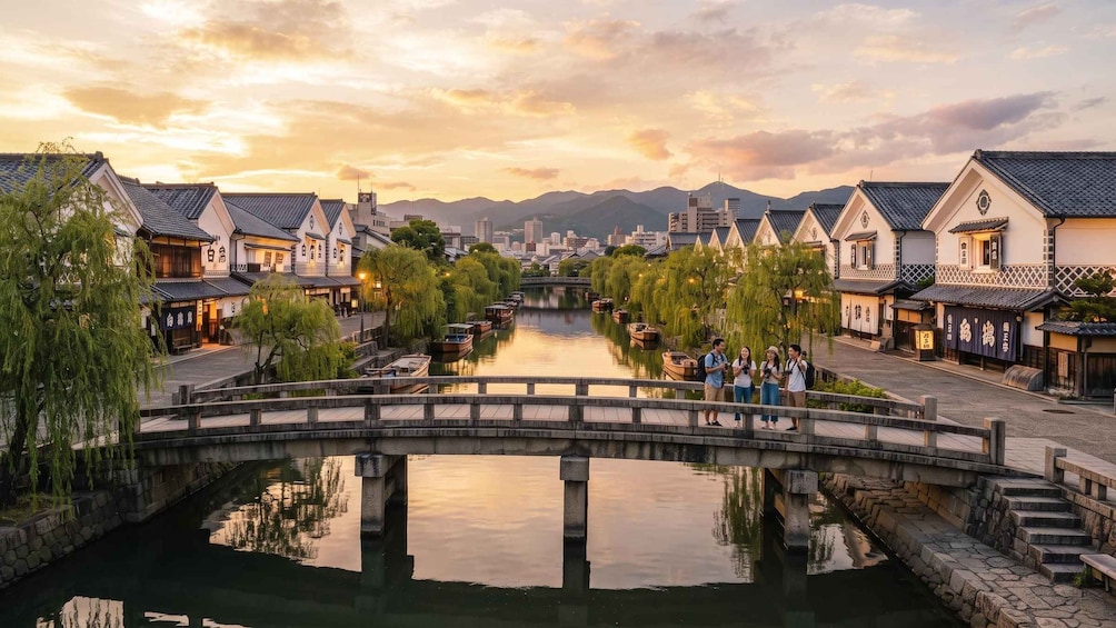 A traditional Japanese town with a river, wooden houses, and a stone bridge. 5