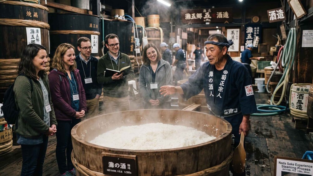 A group of people observing a steaming rice cooker in a traditional setting with wooden barrels and signs in Japanese. 2
