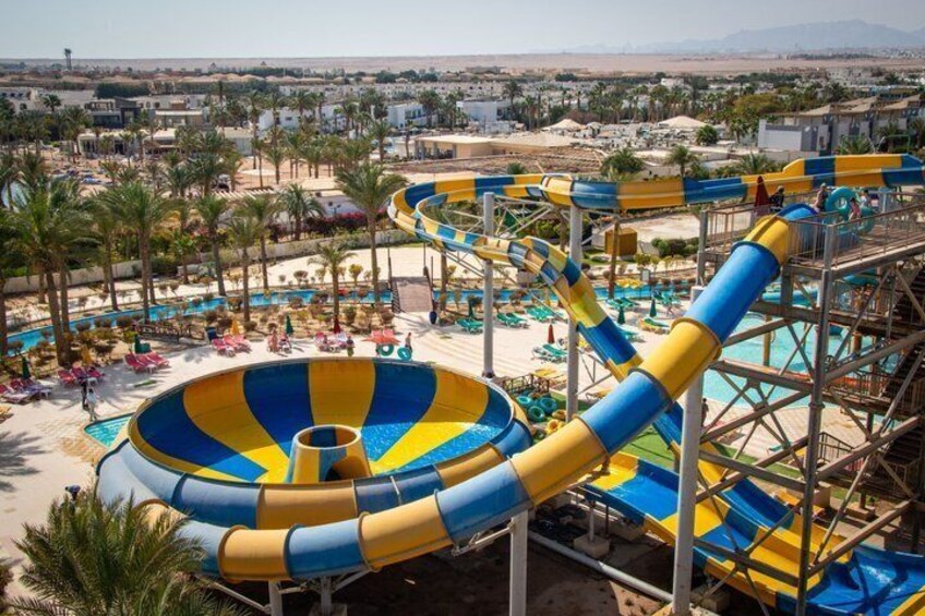 A water park with multiple slides and pools. 2