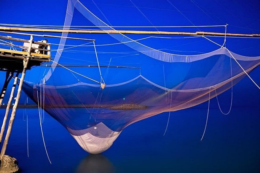 A boat with a net structure. 1