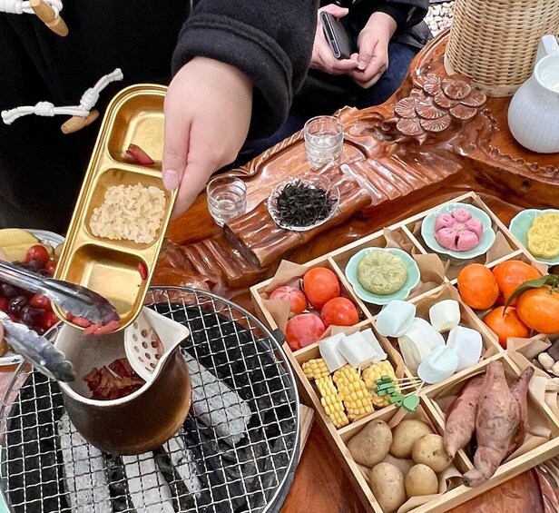 A variety of food items including fruits, vegetables, and a grill. 5