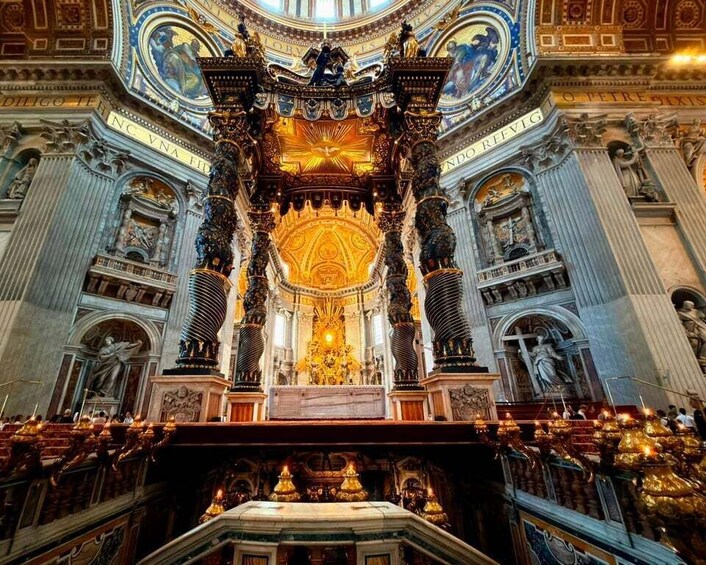 An ornate altar with golden decorations and statues, surrounded by classical architecture. 3