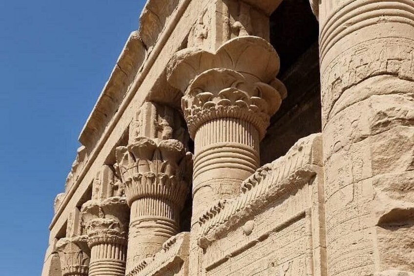 Ancient stone columns with intricate carvings. 3