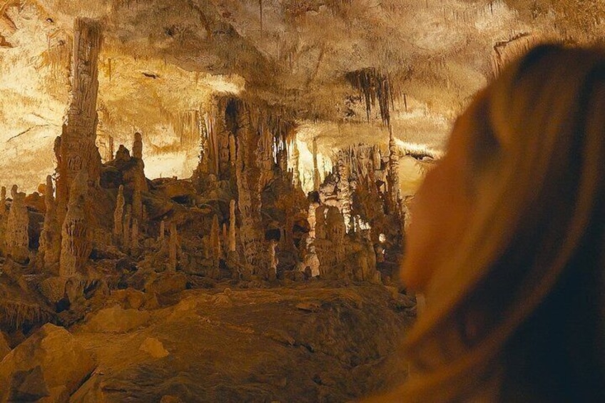 A cave with stalactites and stalagmites. 4