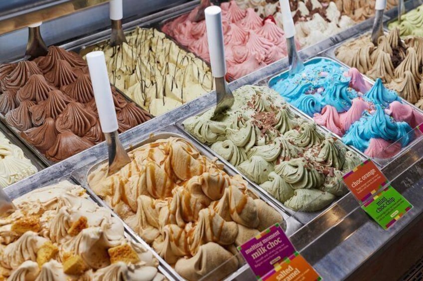 A variety of ice cream flavors in a display case. 3