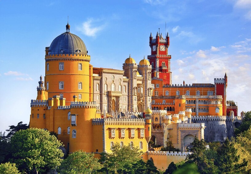 A historic castle with a prominent clock tower, domed structures, and ornate architecture. 3