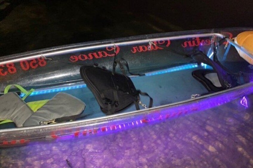 A vehicle with a reflective surface and a blue interior. 4