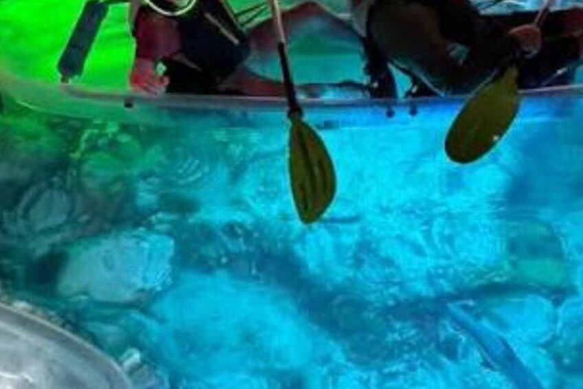 A kayak in a pool with water. 2