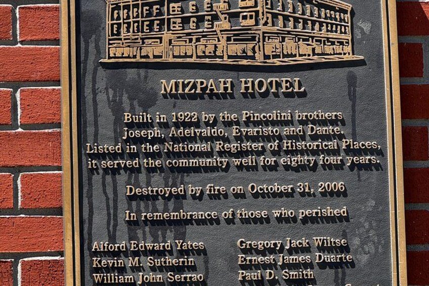 A plaque commemorating the Mizpah Hotel, built in 1922 by the Pincolini brothers, destroyed by fire in 2006, with names inscribed in remembrance. 2
