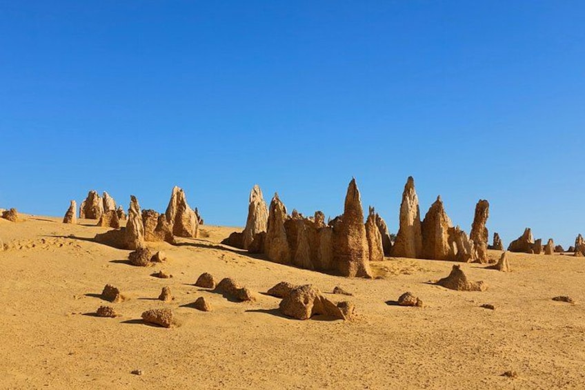 A desert landscape with prominent rock formations. 4