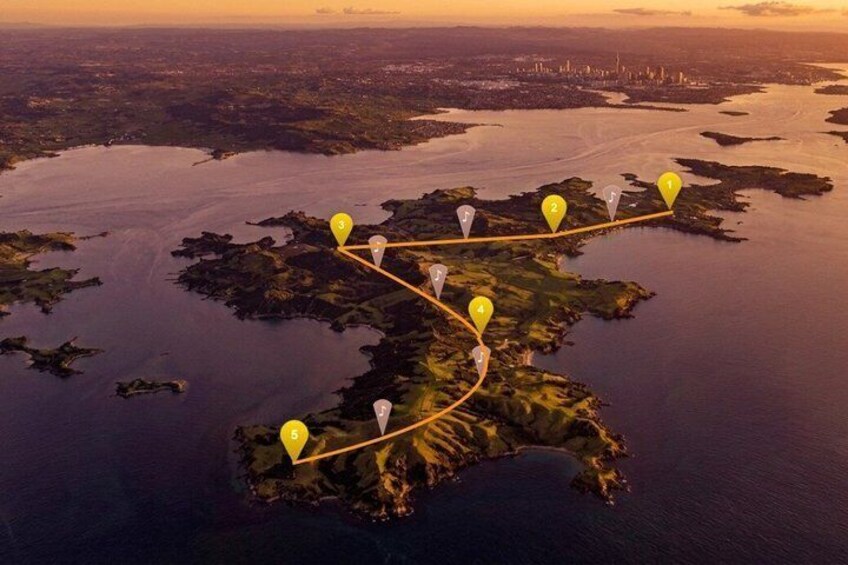 An aerial view of an island with a marked route. 1