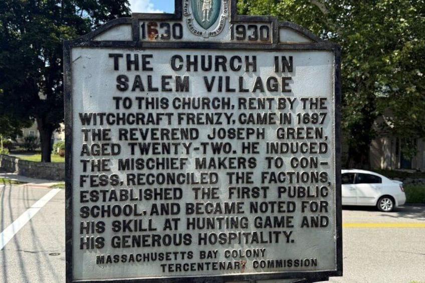 A historical marker about the Church in Salem Village, including dates 1630-1930. 4