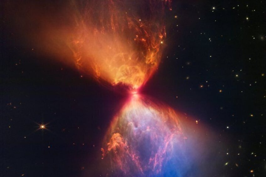 A nebula with bright red and blue colors, stars, and a dark space background. 5
