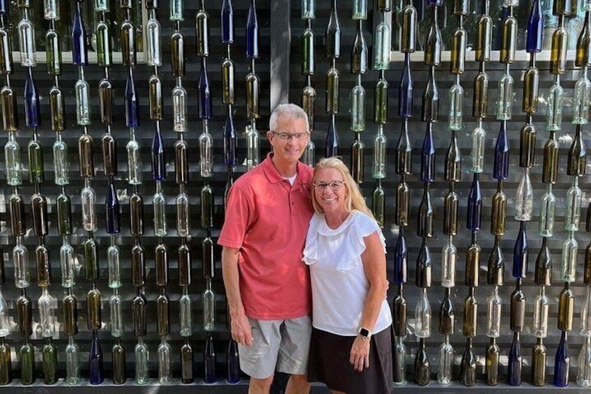 A wall of wine bottles. 4