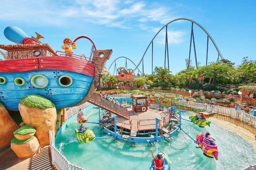 A water park with a large ship-themed ride, a roller coaster, and a pool area with people on watercraft. 1