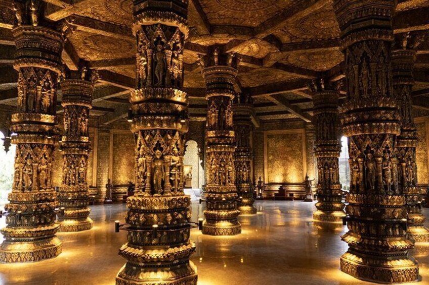 Intricately carved columns in a historical building. 1