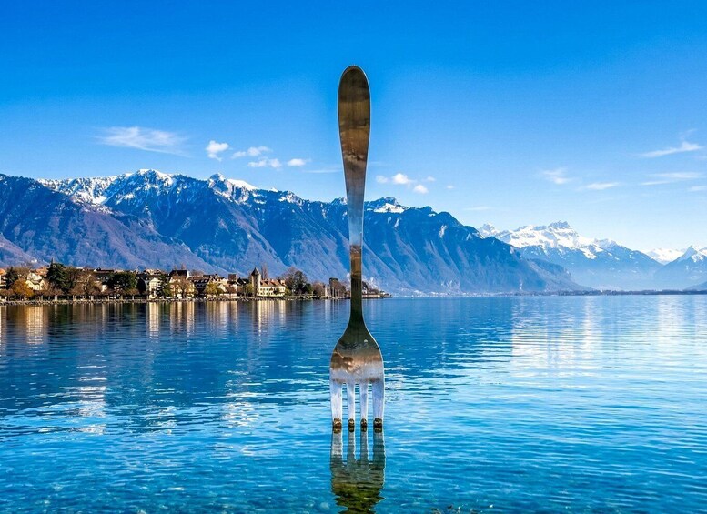 A fork in the water with a mountain backdrop. 1