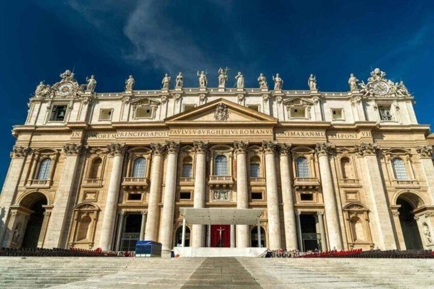 A grand historical building with large columns, statues, and intricate architectural details. 5