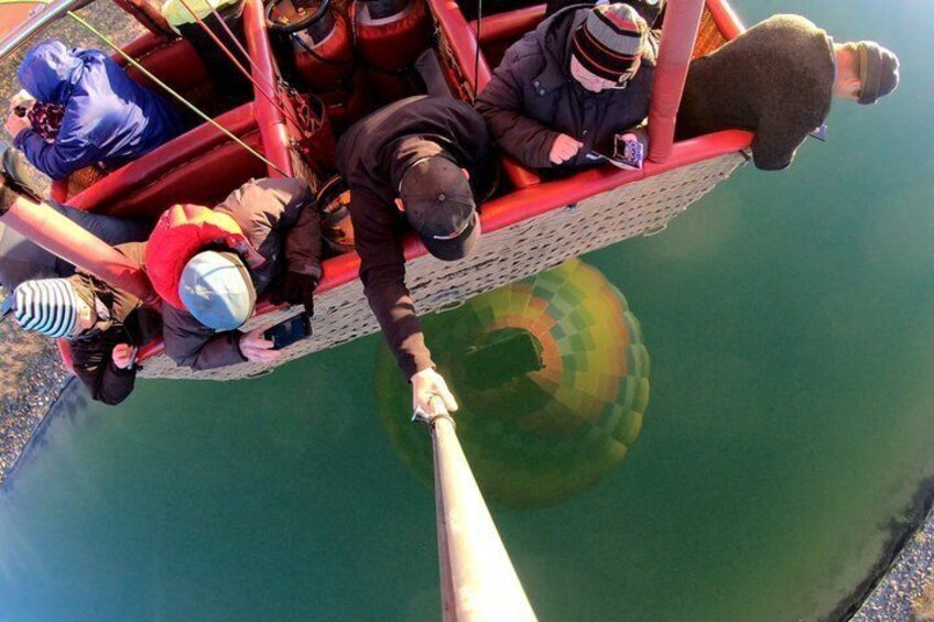 A hot air balloon ride with passengers. 5