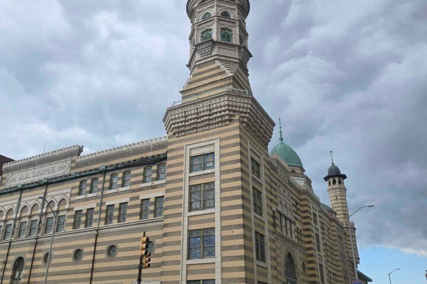 A historic building with a prominent tower and dome. 4
