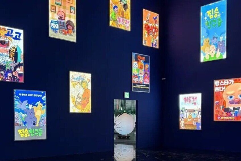 A wall with various anime posters. 4