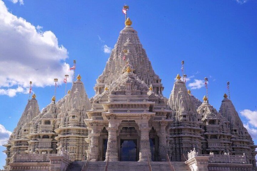 A large, intricately designed temple with multiple spires and a central entrance. 1