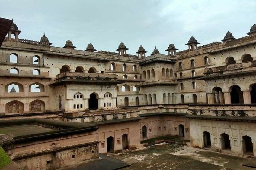 A historical building with multiple arches and domes. 2