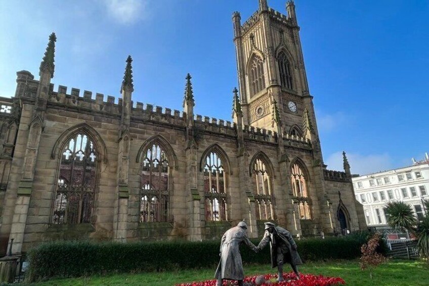 A historic church with a tall tower and arched windows. 4