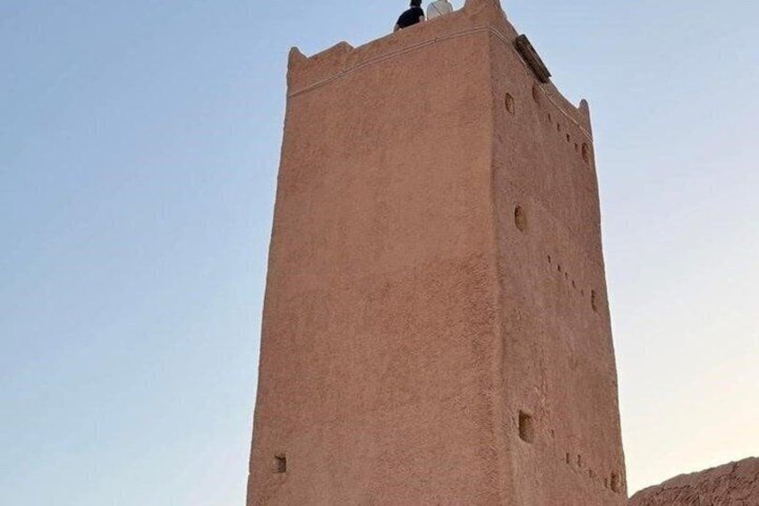 A tall, narrow tower with a flat top and small windows. 3