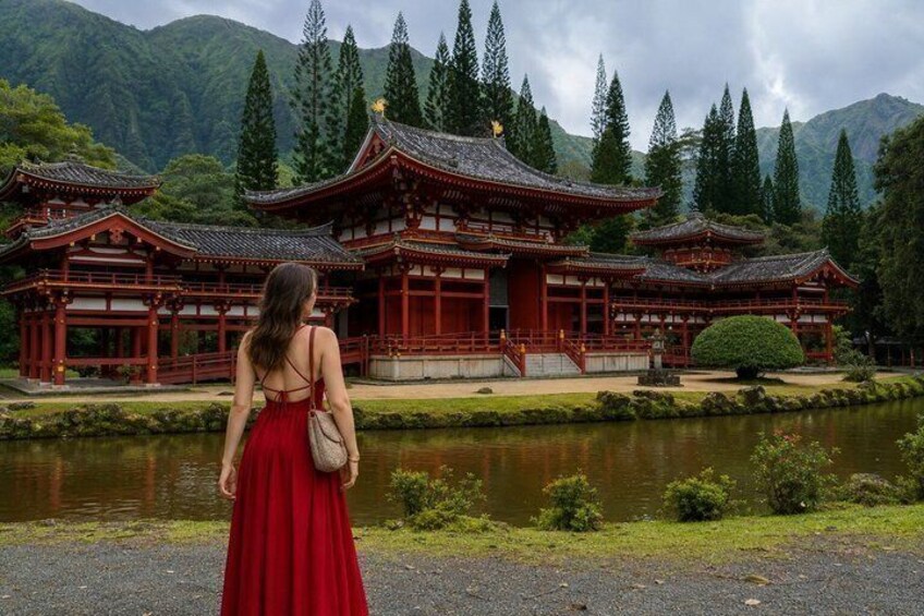 A traditional Japanese temple with a pond in front, surrounded by mountains. 3