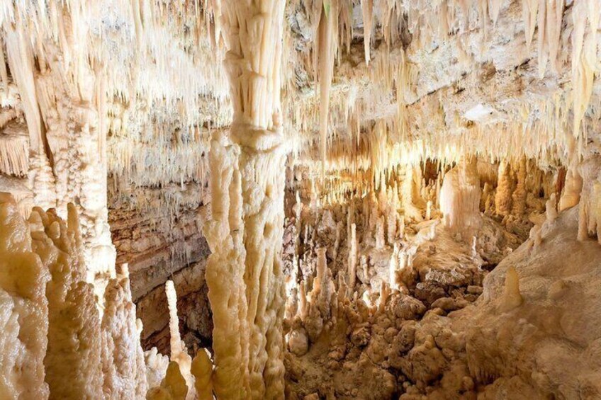 A cave with stalactites and stalagmites. 5